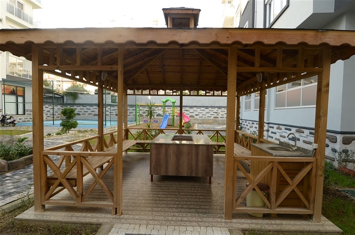 شقة بتخطيط 1+1 ضمن مجمع سكني في منطقة جيكجيلي – ألانيا