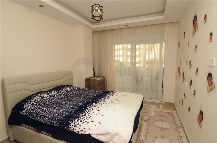 شقة بتخطيط 1+1 ضمن مجمع سكني في منطقة جيكجيلي – ألانيا