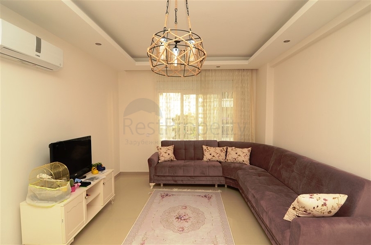 شقة بتخطيط 1+1 ضمن مجمع سكني في منطقة جيكجيلي – ألانيا