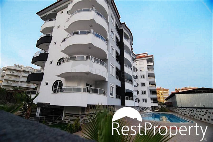 شقة بتخطيط 1+1 ضمن مجمع سكني في منطقة جيكجيلي – ألانيا