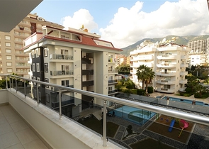 شقة بتخطيط 1+1 ضمن مجمع سكني في منطقة جيكجيلي – ألانيا