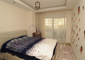 شقة بتخطيط 1+1 ضمن مجمع سكني في منطقة جيكجيلي – ألانيا