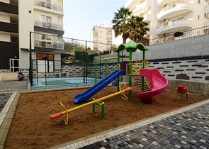 شقة بتخطيط 1+1 ضمن مجمع سكني في منطقة جيكجيلي – ألانيا