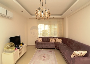 شقة بتخطيط 1+1 ضمن مجمع سكني في منطقة جيكجيلي – ألانيا