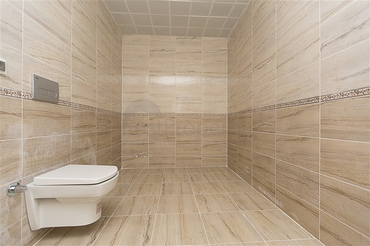 شقق بتصاميم مختلفة ضمن مجمع سكني حديث في افسلار / الانيا 