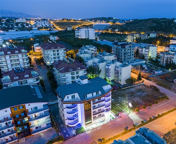 شقق بتصاميم مختلفة ضمن مجمع سكني حديث في افسلار / الانيا 