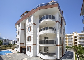 شقق بتصاميم مختلفة ضمن مجمع سكني حديث في افسلار / الانيا 