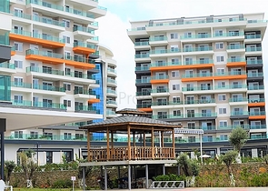 شقة فسيحة بغرفة نوم واحدة في مجمع جديد