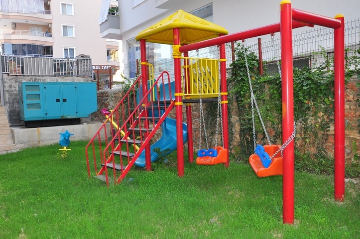 غرفة نوم وصالة مفروضة ضمن مجمع حديث في مهموتلار 