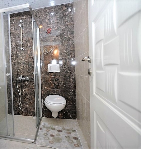 غرفة نوم وصالة مفروضة ضمن مجمع حديث في مهموتلار 