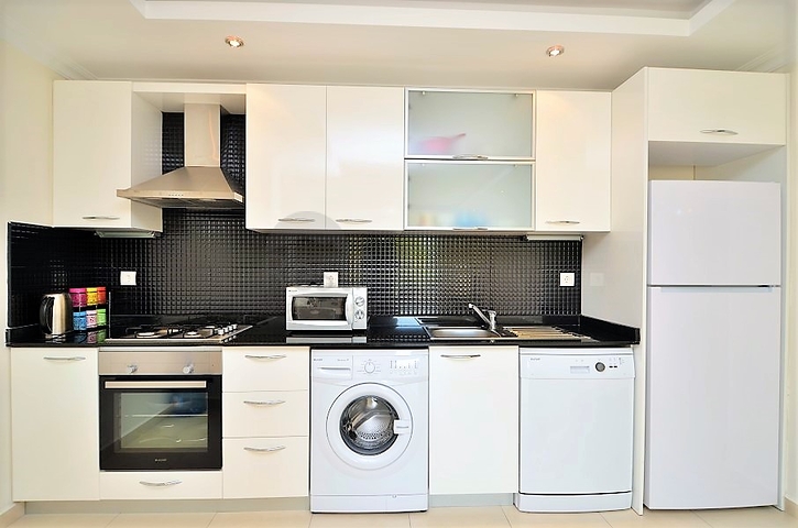 شقة مفروشة من تصميم غرفة وصالة ضمن مجمع خمس نجوم في الانيا منطقة افسلار 