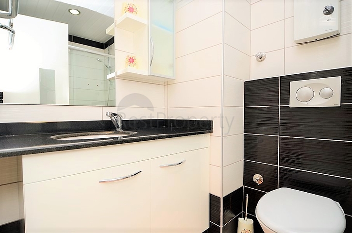 شقة مفروشة من تصميم غرفة وصالة ضمن مجمع خمس نجوم في الانيا منطقة افسلار 