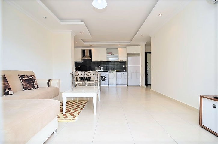 شقة مفروشة من تصميم غرفة وصالة ضمن مجمع خمس نجوم في الانيا منطقة افسلار 