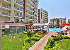 شقة مفروشة من تصميم غرفة وصالة ضمن مجمع خمس نجوم في الانيا منطقة افسلار 