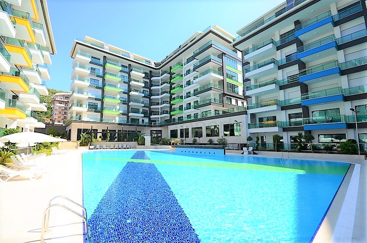 شقة عائلية تصميم ثلاث غرف وصالة - اطلالة بحر - ضمن مجمع مميز في الانيا 