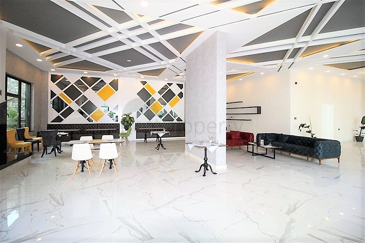 شقة عائلية تصميم ثلاث غرف وصالة - اطلالة بحر - ضمن مجمع مميز في الانيا 