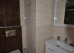 ضمن مجمع يضم كافة الخدمات - في منطقة مركزية - شقة غرفة وصالة - توسمور / الانيا 