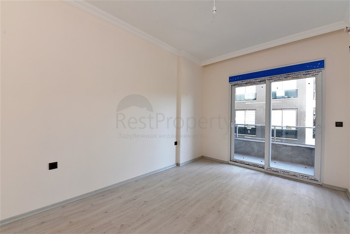 شقة جديدة - تصميم 2 غرفة وصالة -مطبخ منفصل -في مركز الانيا 