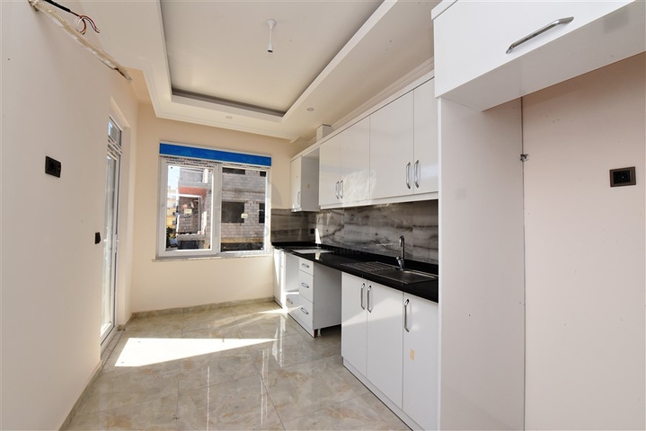 شقة جديدة - تصميم 2 غرفة وصالة -مطبخ منفصل -في مركز الانيا 