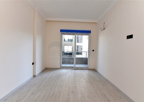 شقة جديدة - تصميم 2 غرفة وصالة -مطبخ منفصل -في مركز الانيا 