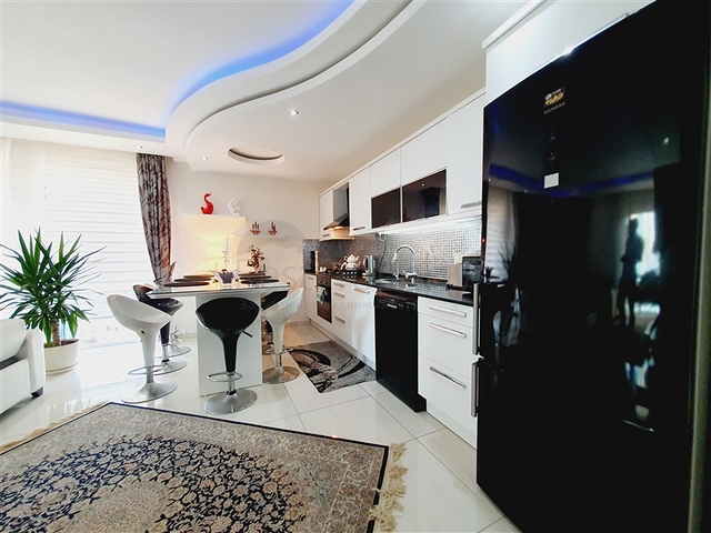 ضمن مجمع فاخر - شقة عائلية - غرفتين وصالة -مفروشة - في مهموتلار / الانيا 