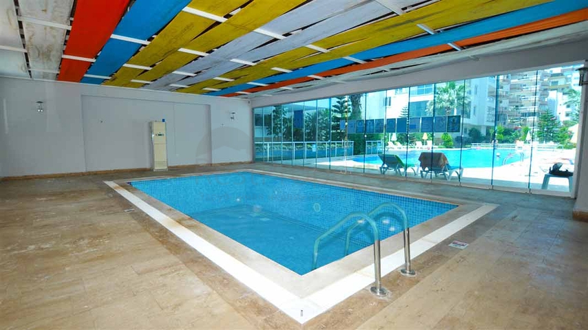 ضمن مجمع فاخر - شقة عائلية - غرفتين وصالة -مفروشة - في مهموتلار / الانيا 