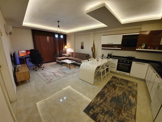 مجمع يضم كافة الخدمات - شقة غرفة وصالة -مؤثثة - في مهموتلار /الانيا 