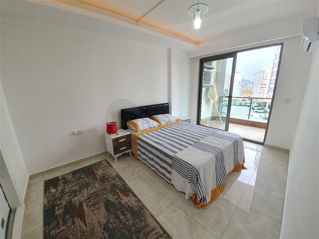 مجمع يضم كافة الخدمات - شقة غرفة وصالة -مؤثثة - في مهموتلار /الانيا 