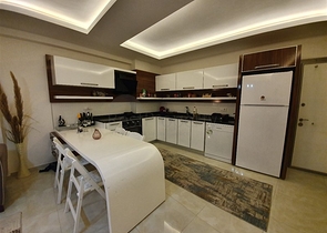 مجمع يضم كافة الخدمات - شقة غرفة وصالة -مؤثثة - في مهموتلار /الانيا 