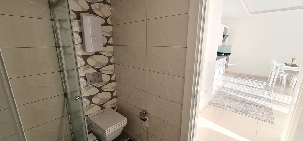 شقة غرفة وصالة - مفروشة -ضمن مجمع سكني حديث - في مهموتلار / الانيا 