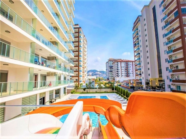 شقة غرفة وصالة - مفروشة -ضمن مجمع سكني حديث - في مهموتلار / الانيا 