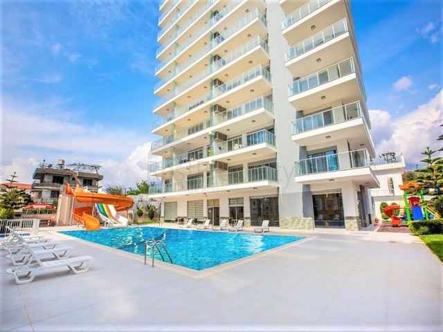 شقة غرفة وصالة - مفروشة -ضمن مجمع سكني حديث - في مهموتلار / الانيا 