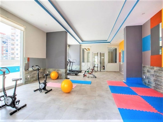 شقة غرفة وصالة - مفروشة -ضمن مجمع سكني حديث - في مهموتلار / الانيا 