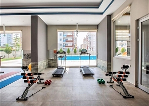 شقة غرفة وصالة - مفروشة -ضمن مجمع سكني حديث - في مهموتلار / الانيا 