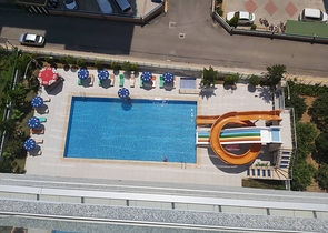 شقة غرفة وصالة - مفروشة -ضمن مجمع سكني حديث - في مهموتلار / الانيا 