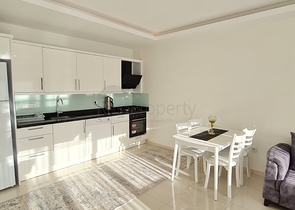 شقة غرفة وصالة - مفروشة -ضمن مجمع سكني حديث - في مهموتلار / الانيا 