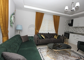 بسعر مناسب - شقة جديدة - تصميم 1+2 - في موقع ممتاز - مهموتلار / الانيا 