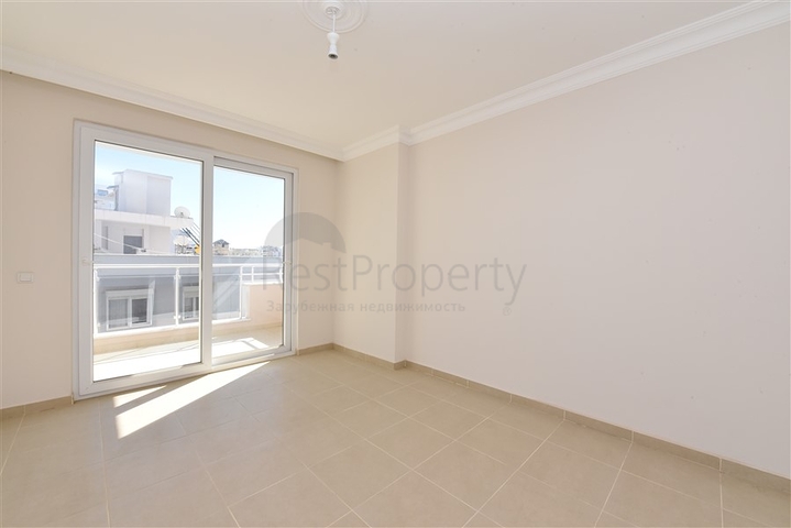 طابق مرتفع -شقة عائلية 1+2- بدون فرش - مجمع انيق - في مهموتلار / الانيا 