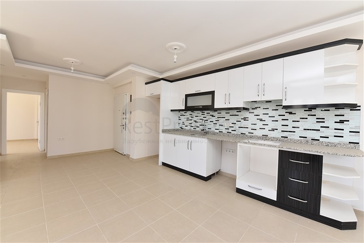 طابق مرتفع -شقة عائلية 1+2- بدون فرش - مجمع انيق - في مهموتلار / الانيا 