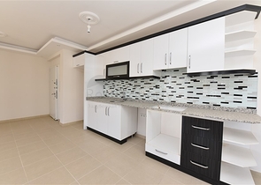 طابق مرتفع -شقة عائلية 1+2- بدون فرش - مجمع انيق - في مهموتلار / الانيا 