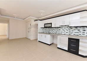 طابق مرتفع -شقة عائلية 1+2- بدون فرش - مجمع انيق - في مهموتلار / الانيا 