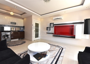 شقة انيقة - بالكون واسع - اطلالة مفتوحة -تصميم غرفة وصالة -في مهموتلار / الانيا 