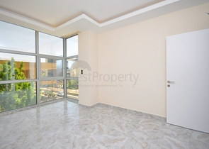 مجمع سكني حديث - جانب المشفى - شقة 2 غرفة وصالة - في اوبا / الانيا 