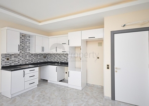 مجمع سكني حديث - جانب المشفى - شقة 2 غرفة وصالة - في اوبا / الانيا 