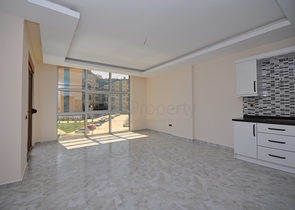 مجمع سكني حديث - جانب المشفى - شقة 2 غرفة وصالة - في اوبا / الانيا 