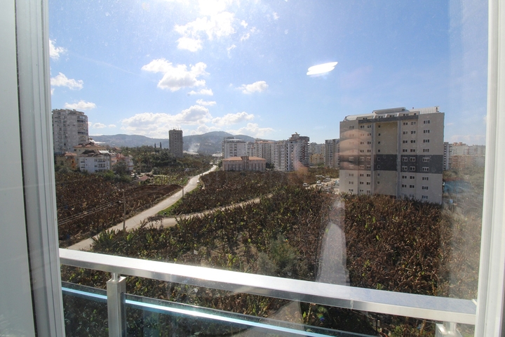 اطلالة مفتوحة -شقة عائلية 2 غرفة وصالة - فرش انيق -في مهموتلار / الانيا 