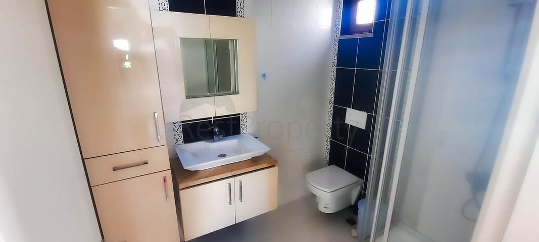 شقة 2 + 1 على مسافة قريبة من البحر في أنطاليا