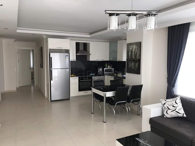 ضمن مجمع عائلي يضم كافة الخدمات -شقة 2 غرفة وصالة -في افسلار /الانيا 