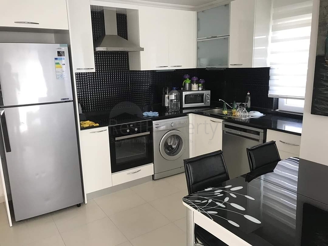 ضمن مجمع عائلي يضم كافة الخدمات -شقة 2 غرفة وصالة -في افسلار /الانيا 