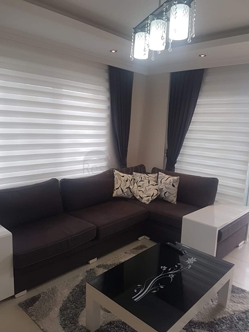 ضمن مجمع عائلي يضم كافة الخدمات -شقة 2 غرفة وصالة -في افسلار /الانيا 